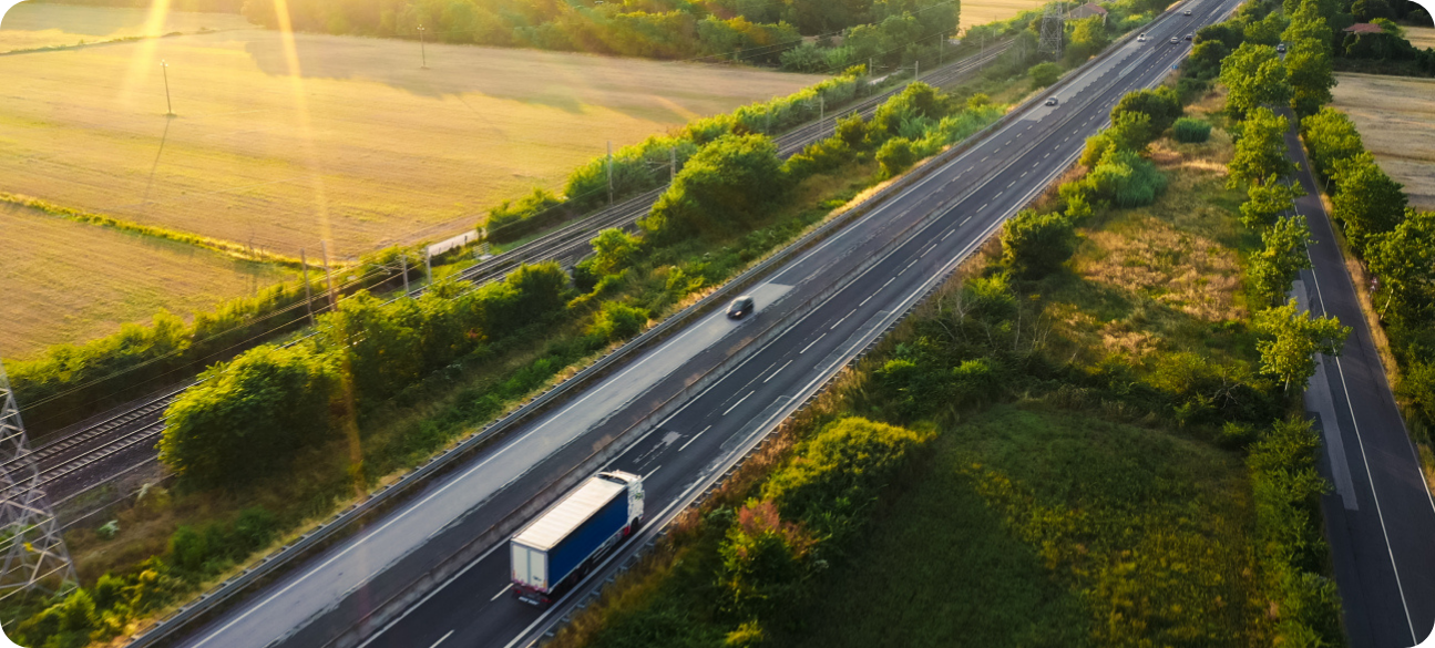 bird's eye view of a highway with cars and trucks